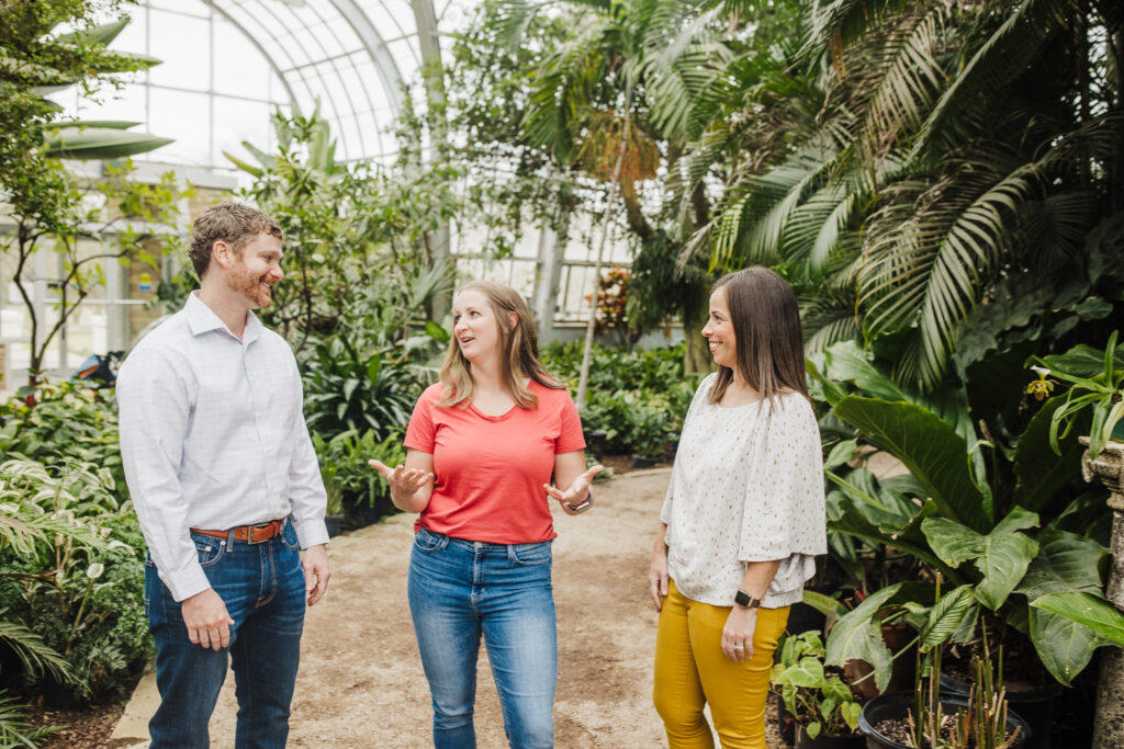 Real Estate Realtysouth Agents Standing In Greenhouse