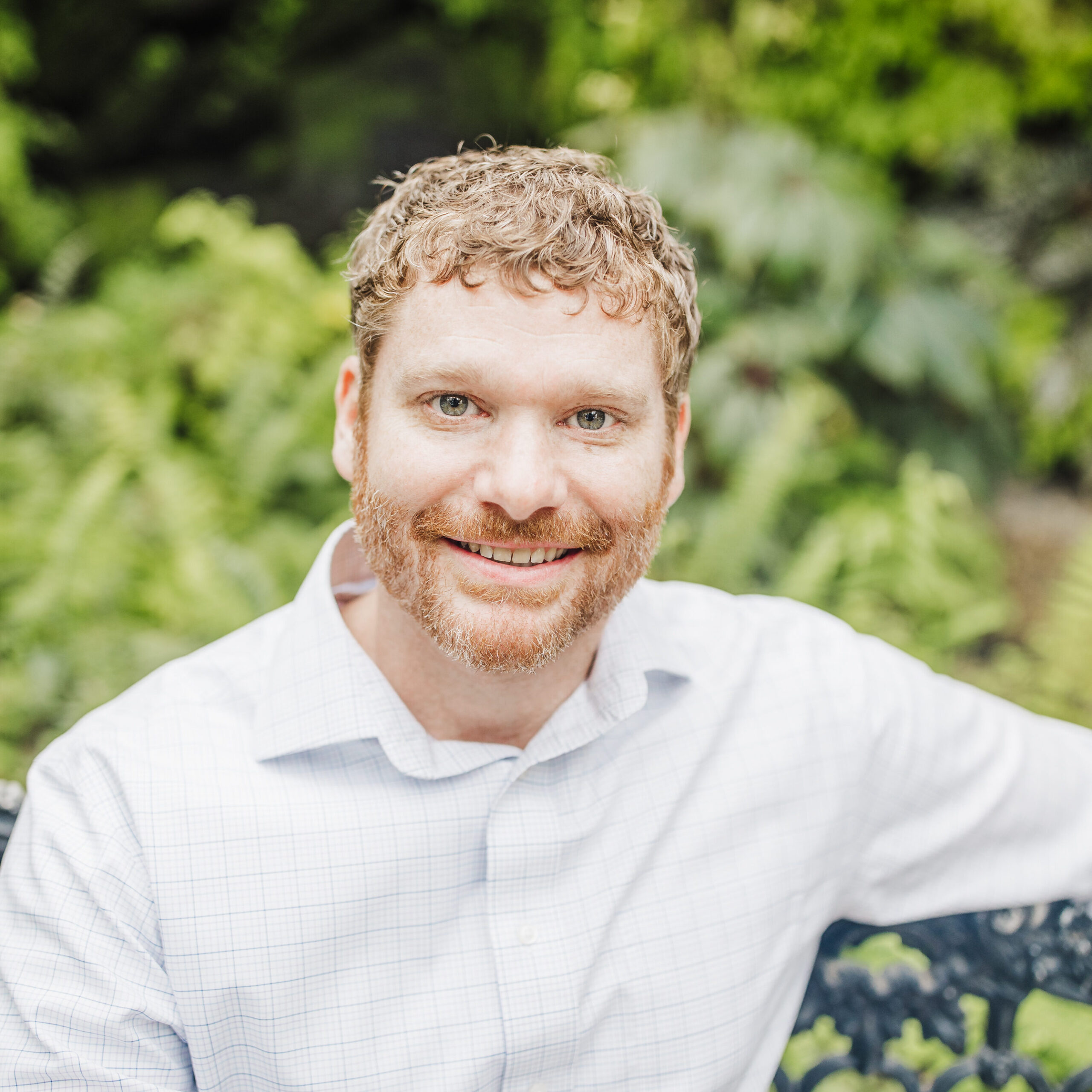 Real Estate Jason Dailey Sitting In Greenery - Top Realtysouth Agent