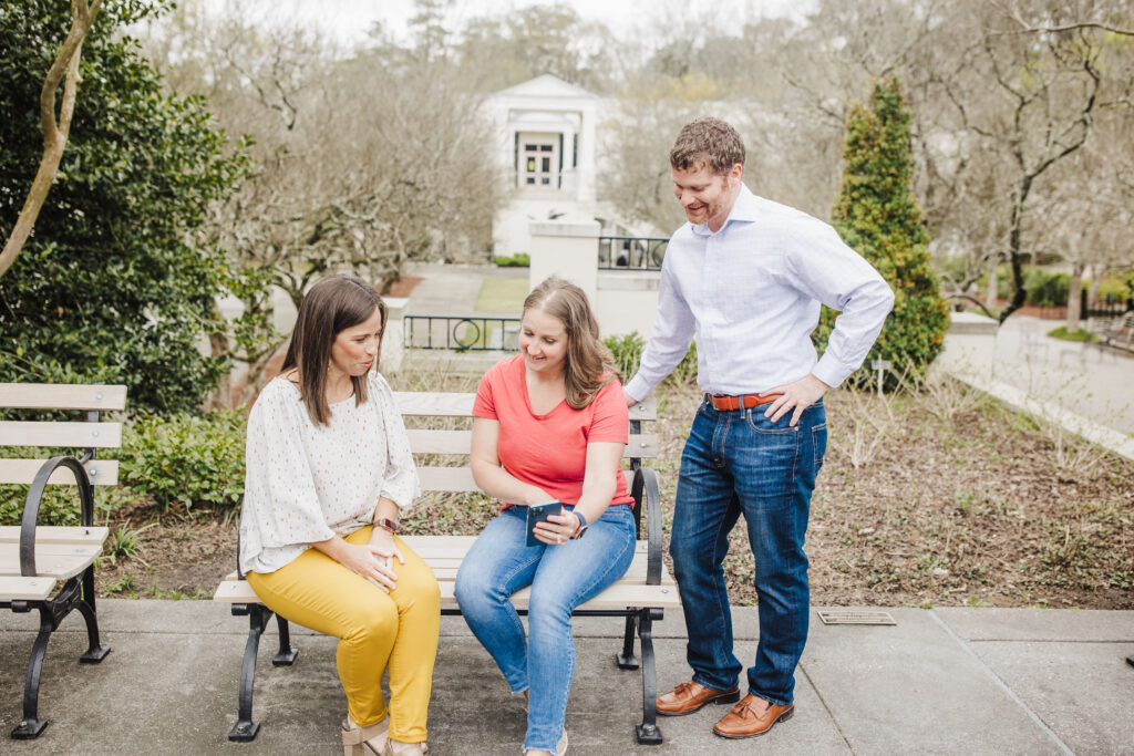 Real Estate Two Realtysouth Agents Sitting On A Bench
