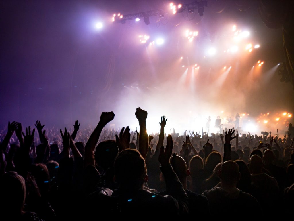 Uncategorized Crowd Facing Lighted Stage