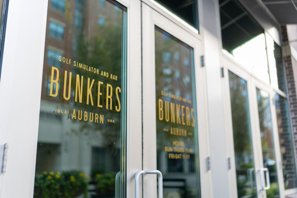 NEW: Indoor golf simulator, restaurant + bar now open in Auburn