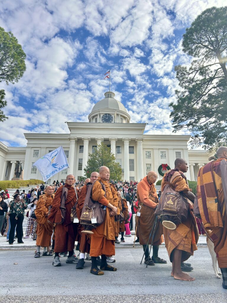 PHOTOS: Walk for Peace monks make extended stop in Montgomery 12 Monks standing in front of state capitol.